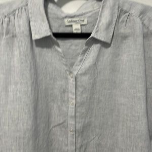 Oversized 100% linen shirt. Very cool and comfortable. Light blue pinstripes.
